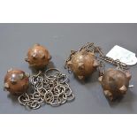 Two 19th century ball and chain, wood and iron ram scarers. Length c. 51cm