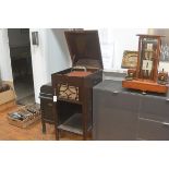 A cabinet gramophone, the Aeolian Vocalion, in a mahogany case (lacking winder).