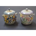 Two vintage Poole Pottery biscuit barrels and a spherical opaque glass light shade. (3) First 14cm