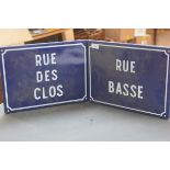 Two French blue enamel street signs, "Rue des Clos" and "Rue Basse". (2) 31cm by 40cm