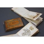 Three Jerusalem ware albums of pressed flowers, early 20th century. (3) 10cm by 17cm