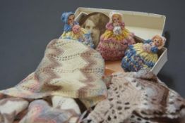 A set of three vintage crochet figural egg cosies, modelled as ladies in bonnets; together with