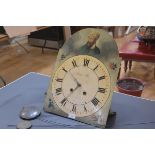 A 19th century painted longcase clock dial, decorated in the arch with a turbanned man, together