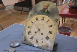 A 19th century painted longcase clock dial, decorated in the arch with a turbanned man, together