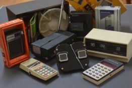 A group of vintage technology including a Sony Walkman, Kodak B-C Flasholder (boxed), a Sawyer's