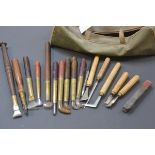 A bag containing a quantity of gilder's tools including agate and hardstone burnishers, most with