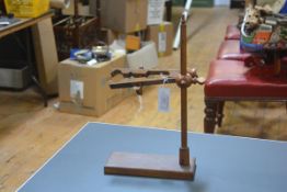 A vintage treen turned wooden test tube holder, the adjustable arm with screw-turn clamp. Height