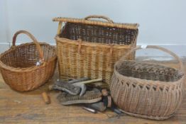 A wicker hamper and two oval wicker baskets (3) First 34cm by 50cm