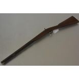 A 19th century percussion lock single barrelled sporting rifle, with walnut stock, steel lock and