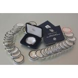 Thirty-five U.S. fine silver Eagle dollars (one in box proof)