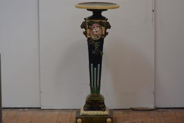 A striking 19th century majolica floorstanding pedestal, the the circular dish top on a tapering
