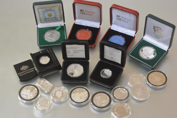 A group of sixteen various silver coins, varying standards, 999, 925 etc, together with a bullion