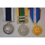 An Elizabeth II Royal Navy group of three medals: the Long Service & Good Conduct medal to
