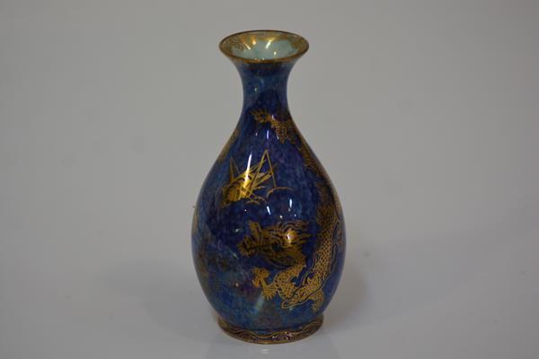 A small Wedgwood dragon lustre vase, c. 1920, of baluster form, decorated with dragons and