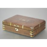 A Continental brass-mounted bird's eye maple pistol case, mid-19th century, of rectangular form, the