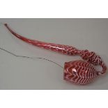 A large Victorian Nailsea "End of Day" glass pipe in pink/cranberry glass, combed in white. Length
