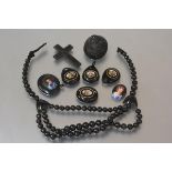 A group of Whitby jet jewellery including four elements of a necklace inset with micromosaic