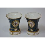 A pair of Royal Crown Derby porcelain vases, in early 19th century style, each of flared form with