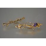Two 9ct gold bar brooches, c. 1900, the first set with an oval-cut amethyst and seed pearls, the