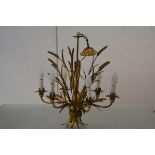 A vintage gilt-metal wheatsheaf chandelier, 1950's, possibly French, six lights on scrolling