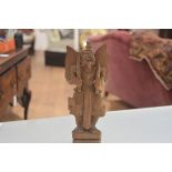 A carved wooden figure of Garuda, possibly Thai, anthropomorphic, modelled standing, with wings,