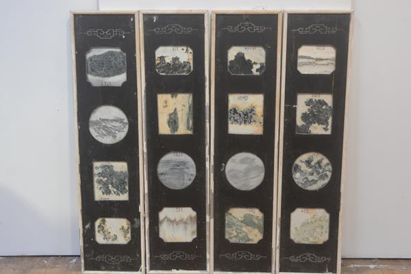 Four framed sets of Chinese dream stone panels, early 20th century, each frame enclosing four panels