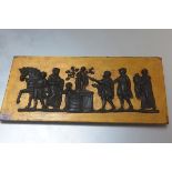 A 19th century giltwood panel, in relief with ebonised Classical figures (probably an element from a