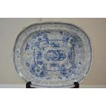 A Staffordshire blue and white meat plate, c. 1840, of shaped oval form, decorated with a literary