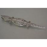 A Sudanese white metal (probably silver, untested) model of a crocodile, in elaborate wirework,