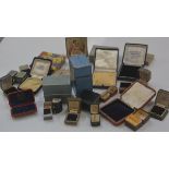 A large group of fitted jeweller's boxes inc. rings, bracelets, brooch and a tartan heart-shaped