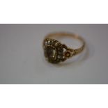 A Victorian foiled citrine and seed pearl cluster ring, with engraved floral and leaf shoulders. 3