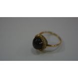 A 14ct gold ring set star sapphire, size Q/R (4g)