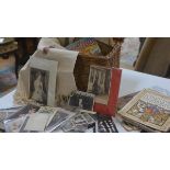 A wicker basket, a large collection of vintage photographs, Victorian and c. 1920/30 etc, an