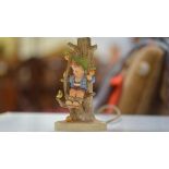 A Hummel figural pottery table lamp, Apple Tree Boy, with shade.