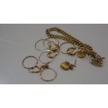 A collection of 9ct gold charms, a heart shaped padlock and bracelet, earrings etc. Total 13 grams