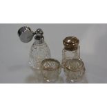 A pair of Sheffield silver mounted crystal salts, chromium plated atomiser and a silver-mounted