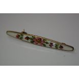 David Andersen, a Norwegian sterling silver and enamel bar brooch, decorated with a floral spray