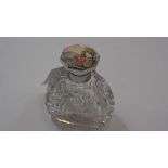 A 1930's crystal, chromium and enamel topped scent bottle. 10.75cm