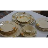 A group of Crown Devon floral painted dinner wares including ashets, side plates, sauce boat etc;