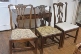 A pair of 19thc mahogany pierced splat back side chairs with slip in seats and square moulded legs