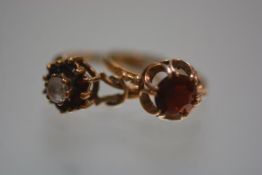 A 9ct gold garnet mounted solitaire ring in claw setting, size Q; and a 9ct gold garnet and paste-