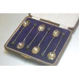 A set of six Birmingham silver bean handled coffee spoons complete with original fitted box