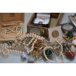 A collection of miscellaneous costume jewellery including paste, pebble jewellery, coins,