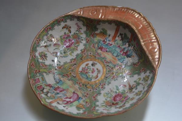 A 19th century Chinese lotus leaf shaped scalloped porcelain dish, decorated with famille rose style