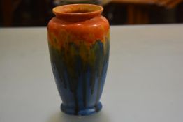 A Crown Ducal 1930s drip glazed tapered cylinder vase, from orange to green and sky blue (h.29cm d.