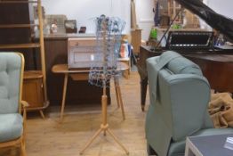 A 1970s ash tailor's dummy stand with central adjustable column with blue enamel wire mesh