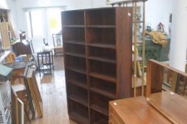 A 1970s rosewood veneered upright two section bookcase fitted six adjustable shelves (h.180cm x