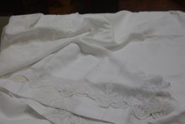 An Edwardian linen drawn thread and embroidered table cloth in floral design (250cm x 230cm) and a