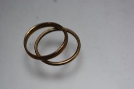 Two 18ct gold wedding bands. Total 4.8 grams