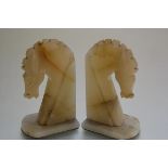 A pair of Art Deco onyx horse head bookends. 18cm